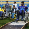 بالصور : ابناء جمعية الأطفال المعوقين يزورون النصر واللاعبين يجربون الكرسي المتحرك