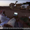 رويترز العالمية تنشر صور لشبان سعوديين بالصحراء يتابعون كأس العالم